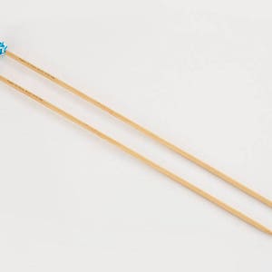 Single point knitting needles
