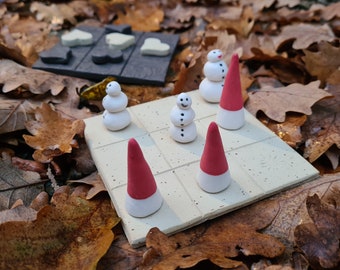 tic tac toe Snowmen, Snowwomen and Santa hats tic-tac-toe game tre i rad spel