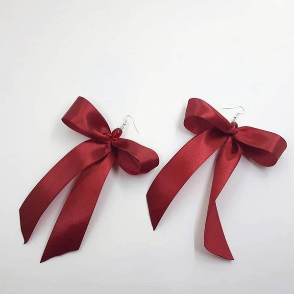Extra large red ribbon bow earrings