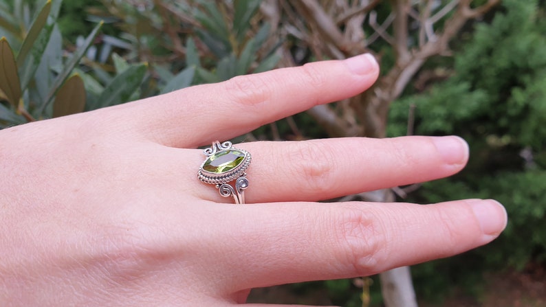 Peridot ring cut in marquise on solid silver