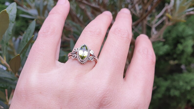 Peridot ring cut in marquise on solid silver