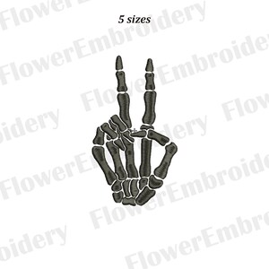 May include: A black and white skeleton hand making the peace sign. The hand is stylized to look like a skeleton with visible bones.