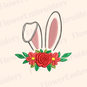 May include: Embroidered design of a pair of bunny ears with a floral wreath. The wreath features red roses and smaller red flowers with yellow centers. The bunny ears are pink with black outlines.