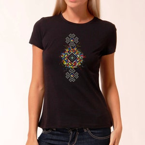 May include: Black t-shirt with a colorful embroidered geometric design on the front.