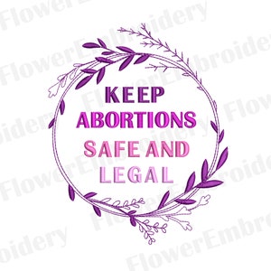 May include: Purple and pink embroidery design with a wreath of leaves and the text "KEEP ABORTIONS SAFE AND LEGAL".