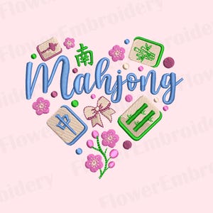 May include: An embroidery design featuring the word Mahjong in blue script, surrounded by mahjong tiles, pink cherry blossoms, a small bow, and green stems. The elements are arranged in a heart shape on a light pink background.