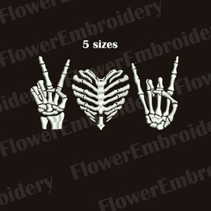 May include: White embroidered design of two skeleton hands making the peace sign and rock and roll hand gestures, with a skeleton ribcage heart in the middle. The design says "Love" in the middle.