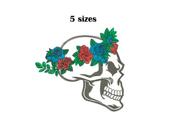 May include: An embroidered skull design with a floral crown of red, blue, and green roses. The text "5 sizes" is above the skull. Below the skull are the file formats: DST, EXP, DSB, SEW, JEF, HUS, VP3, PES, PEC.