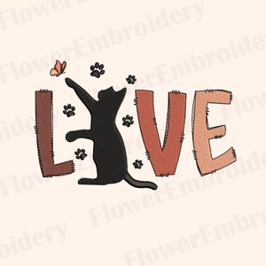 May include: A black cat silhouette jumping for a butterfly with the word "LOVE" in brown, orange, and peach colors. The letters have a stitched look.