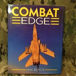 May include: A book titled "Combat Edge" with a photo of a fighter jet on the cover. The book is by Ian Black.
