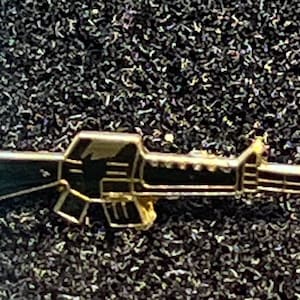 Vintage enamel AR 15 Rifle Backpack lapel pin