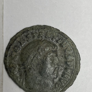 This is a Constantine The Great Roman Ruler  Bronze Coin