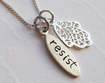 Resist necklace with hamsa charm