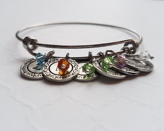 Custom bangle bracelet with hand-stamped charms