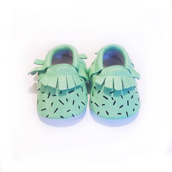 mint green baby shoes