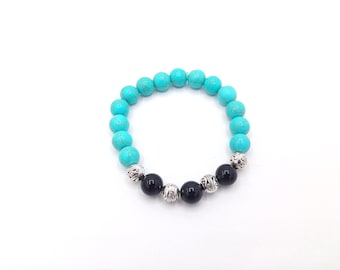 Bracciale elastico con perline blu, turchese e argento