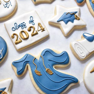 - Royal blue graduation gown cookie with gold cords

- White diploma cookie tied with a royal blue ribbon on top