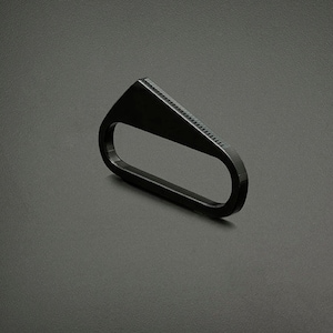 Geometric modern architectural BLACK STAR acrylic hand accessory styled as a knuckle multi finger ring in Small