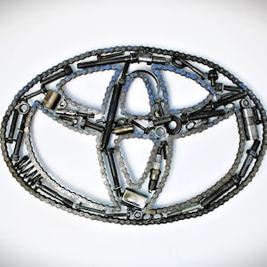 Toyota Logo Car Part Art - Automotive Wall Art, Handcrafted Gift for Auto Enthusiasts