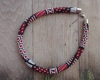 crocheted beaded necklace with geometric pattern,traditional Ukrainian ornament,native colors