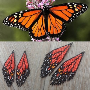 Puede incluir: Un par de pendientes colgantes con un diseño de cuentas negras y naranjas que se asemeja a una mariposa monarca. Los pendientes están hechos con cuentas pequeñas y tienen un aspecto de flecos.