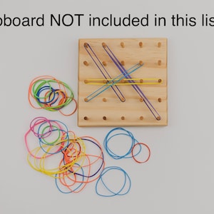 May include: A wooden board with pegs and colorful rubber bands. The text "Geoboard NOT included in this listing" is at the top of the image.