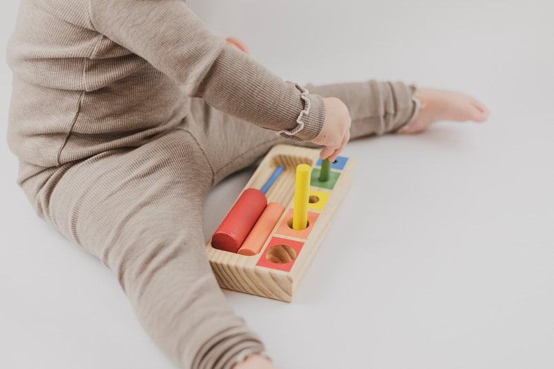 Dowel sorter Cylinder blocks Montessori learning toy Cylinder puzzle image 7