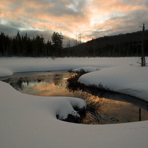 Sunset in winter on Lac-à-René and clouds in reflexions, Chaudière-Appalaches