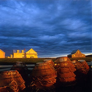 Crab pots, clouds and English home and his settlements, Rivière-la-Madeleine, Gaspe Coast