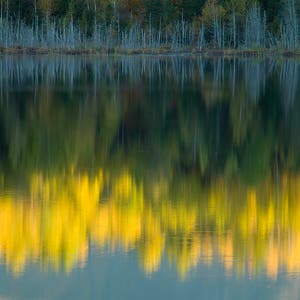 Fall reflections on a Chic-Chocs lake at Cap-Seize near Gaspé Park