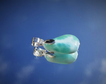 Larimar drop pendant from the Dominican Republic. Also known as the Atlantis or dolphin stone. Gives spiritual and spiritual power.