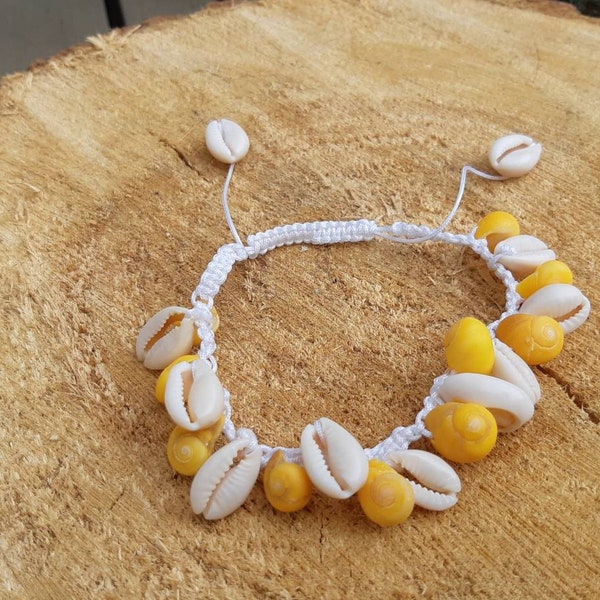 White kauri shell ankle strap with yellow shells and braided satin cord