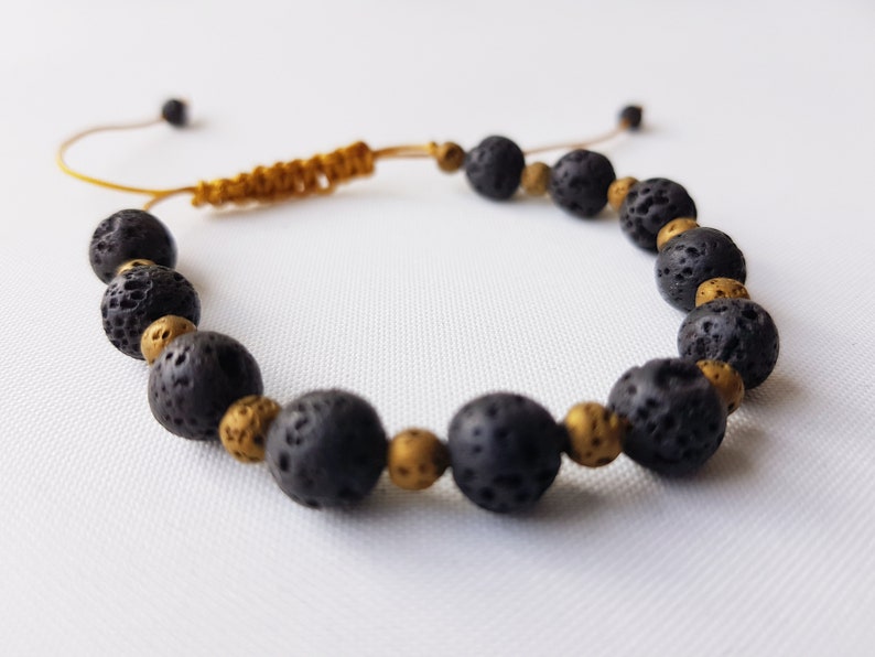 set of two anti stress jewelry Christmas Couple aroma bracelets black and gold volcanic lava stone essential oil diffuser gift for couple