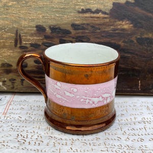 Antiker Anfang des 19.Jh. Staffordshire Georgian Childs Kupfer Glanz mit rosa marmoriertem Luster-Streifen Kleine Tasse