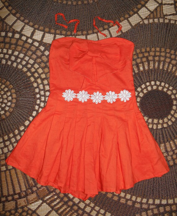 short orange jumpsuit