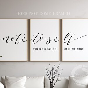May include: Three framed prints with the text "note to self" in cursive script. The middle print says "you are capable of" and the right print says "amazing things".