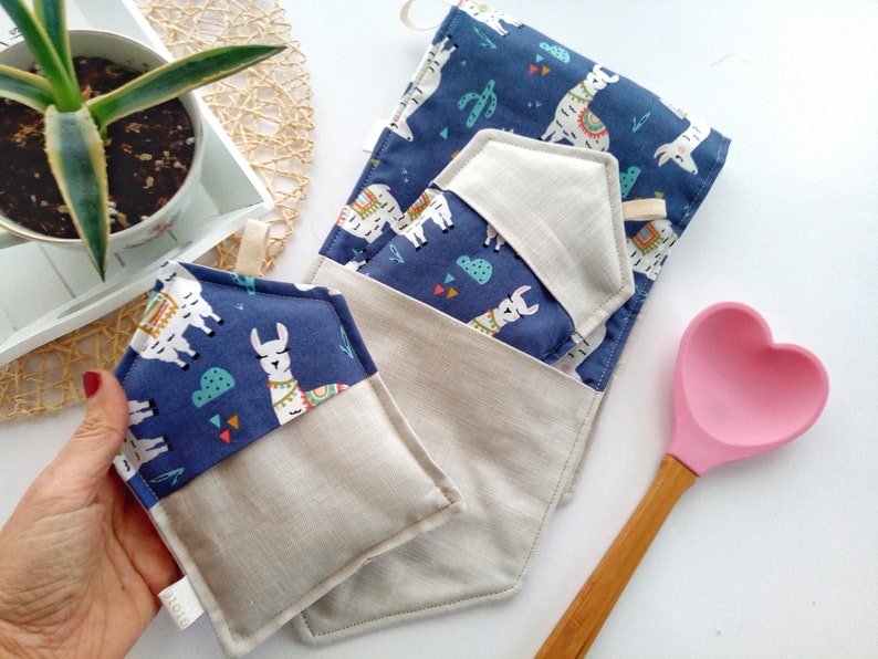 Long oven gloves in linen and fabric with blade.