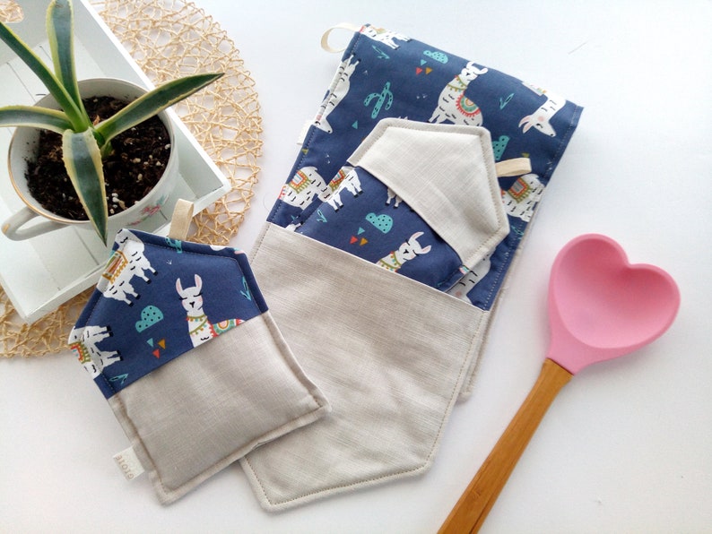 Long oven gloves in linen and fabric with blade.
