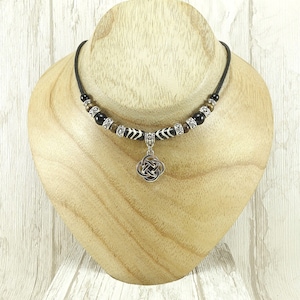 Celtic Eternity Knot Leather Choker Cord Necklace. Handmade Tribal Ethnic Celtic Style Choker with a Small Silver Tone Eternity Pendant.