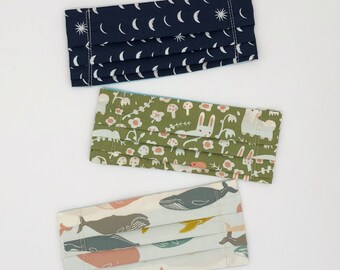 Adjustable organic cotton face mask for kids with filter pocket. Pick your fabric. Pick your tie. Colorful fun prints. Unisex. Girls. Boys