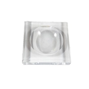 May include: A clear acrylic square dish with a round, raised, clear acrylic center.