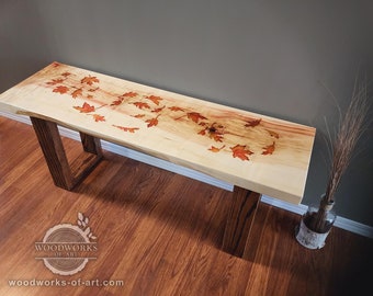 Live-edge maple bench with carved, hand painted epoxy filled leaves, oak legs