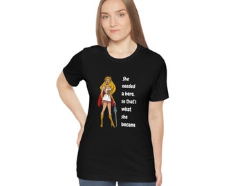 She needed a hero so that's what she became Unisex Jersey Short Sleeve Tee