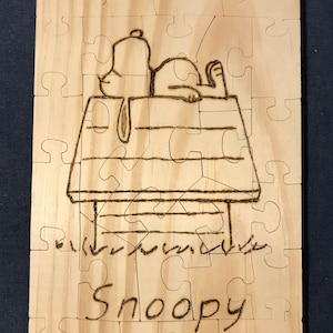 Wood burned Snoopy puzzle