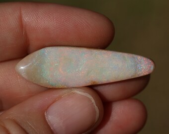 Item:O18558 Mexico Top Quality 6.3ct Polished Fire Opal Crystal Cabochon Perfect for Jewelry