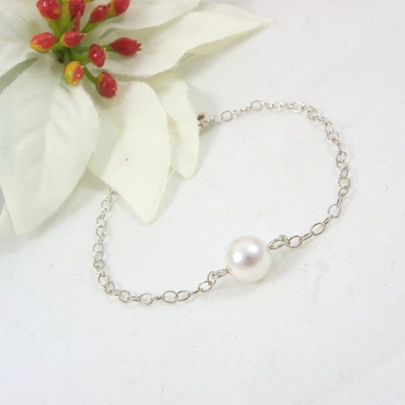 Silver bracelet with pearls and cristal