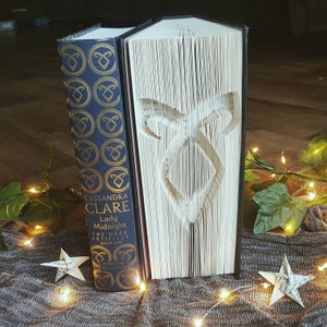 Angel Symbol Cut and Fold book folding pattern