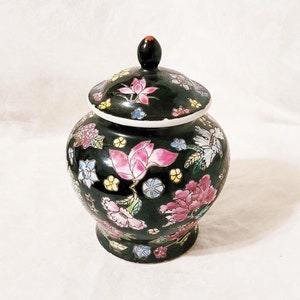 Attractive floral ginger jar from China, decorated with pink, green, blue and black hand painted floral design-14cm tall