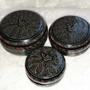 Set of 3 hand painted Oriental nesting boxes embellished with an an attractive dragon design