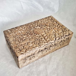 Attractive large rectangular light mango wood trinket box from India, decorated with a hand carved floral design, 25.5cm long